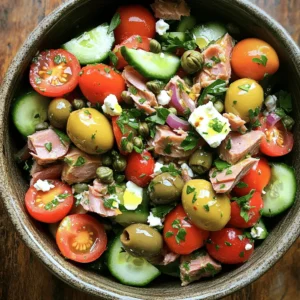 - Tuna (canned in olive oil) - Fresh vegetables (cherry tomatoes, cucumber, red onion) - Kalamata olives and feta cheese - Capers and parsley Let’s dive into the main ingredients. First, I love using tuna canned in olive oil. It adds a rich flavor. Next, fresh vegetables like cherry tomatoes, cucumber, and red onion bring crunch and color. Kalamata olives and feta cheese give the salad a salty kick. I also add capers for a briny taste and parsley for freshness. - Extra virgin olive oil - Fresh lemon juice - Seasonings (salt and pepper) Now, let’s talk about the dressing. I use extra virgin olive oil for its fruity taste. Fresh lemon juice adds brightness. Finally, I season with salt and pepper to enhance all the flavors. - Overview of calorie count and macro breakdown - Health benefits of the primary ingredients This salad is not only tasty but also healthy. On average, one serving has about 300 calories. It’s packed with protein from the tuna. You also get healthy fats from the olive oil and olives. Veggies add fiber and essential vitamins. This meal is great for your heart and helps you feel full. Enjoy this delightful dish while knowing you’re eating well! Combining the salad ingredients Start by gathering your ingredients. In a large mixing bowl, add the drained tuna, halved cherry tomatoes, diced cucumber, finely chopped red onion, halved Kalamata olives, crumbled feta cheese, rinsed capers, and chopped parsley. Use a fork to gently break up the tuna as you mix. This helps blend all the flavors together. Preparing the dressing In a small bowl, whisk together extra virgin olive oil, freshly squeezed lemon juice, salt, and pepper. Mix well until the dressing is smooth and combined. This dressing adds a bright flavor that enhances the salad. Tossing the salad and ensuring even coating Pour the dressing over the tuna mixture. Gently toss everything together until all the ingredients are well coated. Be careful not to break up the feta cheese too much. You want those nice, creamy bites in every scoop. Adjusting seasoning according to taste Take a moment to taste your salad. If you feel it needs more flavor, add more salt, pepper, or lemon juice. This is your chance to make it perfect for you. Importance of allowing flavors to meld Let the salad rest for about 10 minutes at room temperature. This time allows the flavors to blend nicely. It makes a big difference in taste. Optimal time for resting Ten minutes is just right. It’s enough time for the ingredients to soak in the dressing without getting soggy. Enjoy the wait; the result will be worth it! When making Mediterranean tuna salad, the right ingredients matter. For tuna, I recommend using canned tuna packed in olive oil. It adds rich flavor and moisture. Look for brands that source fish sustainably. This choice can enhance taste and support the environment. For olives, choose Kalamata olives. They bring a bold taste that pairs well with tuna. Check for pitted olives to save time. You can find them in jars or from the deli section. When it comes to cheese, feta adds creaminess. Look for blocks of feta rather than crumbled for better texture. Freshness is key, so check the expiration date. For tomatoes and cucumbers, choose ripe options. Ripe cherry tomatoes should feel slightly soft but not mushy. Pick cucumbers that are firm and vibrant green. The flavor will be much better in your salad! To serve your salad, pair it with crusty bread. A nice baguette or pita can soak up the flavors. If you enjoy wine, a crisp white wine complements the dish nicely. For a beautiful display, serve the salad on a large platter. Arrange the ingredients in sections for a colorful look. Garnish with fresh parsley and lemon wedges. This adds a burst of color and invites people to dig in! Balancing flavors is essential for a tasty salad. Start with the dressing. Use a good amount of lemon juice to brighten the dish. The acidity of the lemon pairs well with the rich tuna and feta. Try adding a pinch of red pepper flakes for a touch of heat. This small addition can elevate the whole dish. For garnishes, consider adding capers on top for a salty kick. A few extra parsley leaves will also add a fresh touch. These small details can make your Mediterranean tuna salad stand out. For the full recipe, check the section above. {{image_4}} You can switch up the fish in this salad. Try using salmon or sardines instead of tuna. Both add unique flavors and nutrients. You can also change the cheese. Swap feta for goat cheese or even cheddar. Mix in roasted peppers or artichokes for added taste. Each choice gives the salad a new twist. If you need a gluten-free option, this salad is perfect. Just stick to the fresh ingredients. For a low-carb version, skip the olives or cheese. If you're vegan, use tofu or chickpeas. Both options provide protein and a good texture. This makes the salad filling without meat or dairy. You can adjust the salad based on the seasons. In spring, add fresh herbs like dill or mint. In summer, include sweet corn or snap peas for crunch. Fall is great for roasted squash or pumpkin seeds. Winter calls for hearty greens like kale. These changes keep your salad fresh and exciting all year round. To keep your Mediterranean tuna salad fresh, store it in an airtight container. This helps prevent moisture and air from spoiling it. The salad lasts in the fridge for about 3 days. After that, the ingredients might lose their crunch and flavor. You can freeze this salad, but it’s not ideal. Tuna can change texture when frozen. The olives and vegetables may become mushy. If you still want to freeze it, place it in a freezer-safe container. Label it with the date. Use it within a month for the best taste. To reheat, avoid using a microwave, as it can make the salad soggy. Instead, let it sit at room temperature for about 20 minutes. This helps bring back some texture. If you need warmth, serve it on a plate and warm it gently in a skillet. Add a splash of olive oil to keep it moist. Enjoy your Mediterranean tuna salad as if it were fresh! You can add grains or proteins to make this salad more filling. Here are some tips: - Quinoa: Cooked quinoa adds fiber and protein. - Chickpeas: Canned chickpeas are a great source of protein and easy to add. - Brown rice: This adds bulk and a nutty flavor. - Hard-boiled eggs: Chopped eggs give extra protein and richness. Adding any of these options will keep the salad tasty and healthy. Yes, you can use canned tuna in water. However, there are some flavor differences. Tuna in olive oil is richer and has a distinct taste. It also adds healthy fats. Tuna in water is lighter and lower in calories. If you choose water-packed tuna, consider adding more olive oil in the dressing for flavor. Yes, this salad is great for meal prep. Here are some guidelines: - Make in advance: You can prepare the salad a day before. - Store in the fridge: Keep it in an airtight container. - Add dressing later: Wait to add the dressing until just before eating. This helps keep the salad fresh. Following these tips will keep your Mediterranean tuna salad tasty and ready to enjoy throughout the week. Mediterranean tuna salad brings together fresh flavors and healthy ingredients. We covered essential ingredients like tuna, fresh veggies, olives, and feta. The simple dressing of olive oil and lemon juice elevates the dish. Nutritional insights showed its health benefits and low calories. Consider trying different fish or veggie options for variety. This salad is perfect for meal prep and offers great storage tips. Trust me, you’ll love how easy it is to make a dish that tastes fantastic and nourishes your body. Enjoy every bite!