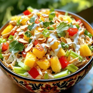 When making Hawaiian chicken salad, fresh and vibrant ingredients are key. Here’s what you need: - 2 cups cooked chicken breast, shredded - 1 cup pineapple chunks (preferably fresh for optimal flavor) - 1/2 cup red bell pepper, diced into small pieces - 1/2 cup celery, finely diced - 1/4 cup green onion, chopped (white and green parts) - 1/4 cup sliced almonds or chopped macadamia nuts for an extra tropical essence - 1 cup Greek yogurt (or mayonnaise for a richer texture) - 2 tablespoons honey (for sweetness) - 1 tablespoon freshly squeezed lime juice - Salt and freshly ground black pepper, to taste - Fresh cilantro leaves for a vibrant garnish These ingredients blend well to create a salad that bursts with flavor. I always recommend using fresh pineapple. It adds a juicy sweetness that canned versions can't match. The crunch from the bell pepper and celery balances the tender chicken. The nuts give a delightful crunch, making each bite fun. You can mix and match the toppings to suit your taste. For the dressing, Greek yogurt adds creaminess without too many calories. Honey brings a subtle sweetness that pairs perfectly with lime juice’s tartness. This mix coats the salad beautifully. If you want to try a tropical twist, use macadamia nuts instead of almonds. They give a rich flavor that complements the salad well. For the full recipe, check out the detailed cooking instructions! 1. Mixing the ingredients Start by taking a large bowl. Add 2 cups of cooked chicken breast, shredded. Then, toss in 1 cup of pineapple chunks, 1/2 cup of diced red bell pepper, 1/2 cup of finely diced celery, and 1/4 cup of chopped green onion. If you want a nutty flavor, add 1/4 cup of sliced almonds or macadamia nuts. Stir everything together gently so that it mixes evenly. 2. Preparing the dressing In another small bowl, place 1 cup of Greek yogurt or mayonnaise if you prefer a richer taste. Add 2 tablespoons of honey for a touch of sweetness. Squeeze in 1 tablespoon of freshly squeezed lime juice. Season with a pinch of salt and pepper. Whisk this mixture until smooth and well combined. Make sure the honey mixes in well. 3. Combining everything Pour the yogurt dressing over the chicken mixture. Use a spatula to fold it in gently. Make sure every piece of chicken and fruit gets coated with the creamy dressing. This step is key for flavor. 4. Chilling the salad Taste the salad to see if it needs more salt or pepper. Adjust if needed. Once satisfied, cover the bowl with plastic wrap or a lid. Place it in the fridge for at least 30 minutes. This chilling step helps the flavors blend well and makes the salad even tastier. 5. Serving suggestions When you're ready to serve, give the salad a gentle toss to mix it again. You can serve it on a bed of mixed greens for a fresh look. Another fun idea is to wrap it in large lettuce leaves or tortillas for a tasty handheld treat. Don’t forget to add a sprinkle of fresh cilantro leaves on top for a nice finish. This full recipe for Aloha Tropical Chicken Salad is sure to impress your family and friends. Enjoy every bite! - Using fresh ingredients: Fresh items make your salad taste great. Choose ripe pineapple, crisp bell peppers, and tender chicken. Fresh ingredients brighten the dish and add flavor. - Adjusting flavors: Taste your salad as you make it. You can add more lime juice or honey if you want it sweeter or tangier. Don’t be afraid to adjust to your liking. - Presentation ideas: Serve your salad on a bed of greens for color. You can also wrap it in lettuce leaves or tortillas. Garnish with fresh cilantro for a beautiful touch. - Over-mixing the salad: Be gentle when mixing. Over-mixing can make your chicken and veggies mushy. You want each piece to stay intact for a nice bite. - Using canned pineapple versus fresh: Canned pineapple can taste too sweet and syrupy. Fresh pineapple gives a bright taste and better texture. Always opt for fresh if you can. - Skipping the chilling step: Chilling the salad is key. It helps the flavors blend well. If you skip this, your salad might not taste as good. Plan to chill it for at least 30 minutes before serving. {{image_4}} You can make Hawaiian chicken salad even more fun by adding new flavors. One great twist is to include fruits like mango or grapes. These fruits add a sweet touch and bring bright colors to the dish. If you love a crunch, try different nuts. Sliced almonds or chopped macadamia nuts work well. You can also use walnuts or pecans for a different taste. Another way to change the salad is by using alternative dressings. You might swap Greek yogurt for a zesty vinaigrette or a creamy ranch. Each dressing gives the salad a unique flavor. You can even mix in spices like curry or chili powder to make it more exciting. If you need gluten-free options, this salad is easy to adapt. All the ingredients are naturally gluten-free. Just be sure to check labels on any packaged items. For those who want dairy-free alternatives, you can replace Greek yogurt with coconut yogurt. This keeps the salad creamy while adding a hint of coconut. Low-calorie modifications are simple too. Use less honey or cut down on the nuts. You can also replace the chicken with shredded tofu for a lighter meal. These options let you enjoy Hawaiian chicken salad while sticking to your diet. To keep your Hawaiian chicken salad fresh, store it in an airtight container. Place it in the fridge right after serving. This method helps retain flavor and texture. If you want to freeze it, use a freezer-safe container. Make sure to leave some space for expansion. I recommend freezing it for up to three months. When you're ready to eat, thaw it overnight in the fridge. In the fridge, your Hawaiian chicken salad lasts about three to four days. Always check for signs of spoilage before eating. Look for changes in color, texture, or smell. If it smells sour or looks slimy, it is best to toss it. Safe food practices ensure you enjoy this tasty dish without worry. How long can Hawaiian chicken salad be kept in the fridge? Hawaiian chicken salad can last up to three days in the fridge. Make sure to store it in a sealed container. The flavors will blend better after chilling, but keep an eye on it to avoid spoilage. Can I use canned chicken for this recipe? Yes, you can use canned chicken for this recipe. It saves time and still tastes good. Just drain the chicken well and shred it before mixing it into your salad. What can I serve with Hawaiian chicken salad? You can serve Hawaiian chicken salad on a bed of greens or in lettuce wraps. It also pairs well with rice, quinoa, or fresh fruit. For a crunch, add crackers or tortilla chips on the side. Enjoy the full recipe for more ideas! This blog post shared a complete guide to making a tasty Hawaiian chicken salad. We looked at the main ingredients and how to mix them for the best flavor. I offered tips to avoid common mistakes and suggested fun variations. Remember to chill your salad for better taste. Use fresh ingredients to make it shine. Always store leftovers properly to enjoy later. With these easy steps, you can create a dish that impresses your friends and family every time. Enjoy making your salad!
