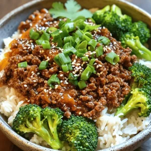 To make a Korean Ground Beef Bowl, you need simple and tasty ingredients. Each one adds flavor and depth to the dish. Here’s what you need: - 1 lb ground beef - 2 tablespoons soy sauce - 1 tablespoon sesame oil - 2 tablespoons brown sugar - 2 cloves garlic, minced - 1 tablespoon fresh ginger, grated - 1 teaspoon red pepper flakes - 2 green onions, finely chopped - 1 cup cooked jasmine rice - 1 cup steamed broccoli florets - 1 tablespoon sesame seeds for garnish These ingredients work together to create a satisfying meal. The ground beef is rich and savory. Soy sauce adds umami, and sesame oil brings a nutty flavor. Brown sugar balances the saltiness with sweetness. Garlic and ginger provide warmth and depth. The red pepper flakes give a nice kick. Green onions add freshness and color. Jasmine rice serves as a fluffy base. Lastly, steamed broccoli adds health and crunch. If you follow the Full Recipe, you can whip up this flavorful dinner delight quickly. 1. Start by heating a large skillet over medium-high heat. 2. Once the skillet is hot, add the ground beef. 3. Use a wooden spoon to break the beef apart as it cooks. 4. Cook until it’s browned, about 5 to 7 minutes. 1. After cooking, drain any excess fat from the skillet. 2. Carefully keep the tasty juices that add flavor. 3. Now, add the minced garlic and grated ginger to the beef. 4. Sauté these aromatics for 1 minute until fragrant. 5. Lower the heat and pour in the soy sauce and sesame oil. 6. Add the brown sugar and red pepper flakes. 7. Mix everything until the beef is coated in the sauce. 8. Cook for an additional 2 to 3 minutes to blend flavors. 1. Remove the skillet from the heat. 2. Gently fold in the chopped green onions. 3. Scoop fluffy jasmine rice into a bowl as a base. 4. Top the rice with a generous serving of the beef mixture. 5. Add steamed broccoli florets on the side. 6. Finish by sprinkling sesame seeds on top for a nice crunch. Following these steps makes a Korean Ground Beef Bowl that is simple and tasty. For the full recipe, check the detailed instructions above. Enjoy your cooking! To make your Korean ground beef bowl perfect, adjust the spice levels to your taste. Start with one teaspoon of red pepper flakes. You can always add more if you like heat. If you want less spice, use half a teaspoon or skip it altogether. For more umami flavor, try adding a splash of fish sauce. It gives depth to the dish. You can also mix in a bit of miso paste for extra richness. Both options boost the savory taste without overpowering the other flavors. When serving, use deep bowls for a cozy feel. It helps keep everything together. Layer the jasmine rice at the bottom, then add the beef mixture on top. Contrast is key for visual appeal. Bright green broccoli stands out against the brown beef. You can also sprinkle some sesame seeds on top for a nice touch. If you have furikake seasoning, it adds more color and flavor. To achieve perfect browning on your ground beef, keep the heat at medium-high. This helps create a nice crust. Break the meat apart with a wooden spoon as it cooks. When adding the sauce, pour it evenly over the beef. Stir well to coat every piece. This method ensures that each bite is full of flavor. Try to avoid letting the sauce sit too long without stirring, as it can burn. {{image_4}} You can change the protein in your Korean Ground Beef Bowl for variety. Ground turkey or chicken works well. These meats are leaner but still absorb the sauce's flavors. They offer a lighter option if you're watching your fat intake. If you prefer a meatless meal, try plant-based meat. Options like lentils or soy crumbles can replace ground beef. They provide a similar texture and soak up the tasty sauce. This way, everyone can enjoy the dish, no matter their diet! Not all kitchens have the same ingredients. You can use tamari instead of soy sauce. Tamari is gluten-free and has a similar taste. This swap is perfect for people with gluten sensitivities. You can also explore rice options. While jasmine rice is a classic choice, you can use brown rice for added fiber. Quinoa is another great alternative. It cooks quickly and adds a nutty flavor to your bowl. Serving your Korean Ground Beef Bowl with different vegetables can change the meal. Try adding bell peppers, snap peas, or carrots for color and crunch. Steamed or sautéed greens like bok choy or spinach also work well. You can elevate your dish by adding eggs or kimchi. A fried egg on top adds richness. Kimchi brings a tangy flavor and extra spice. These toppings make your meal more exciting and full of flavor. For the full recipe, check out the complete instructions above! To keep your Korean Ground Beef Bowl fresh, store leftovers in airtight containers. This helps prevent spoilage and keeps flavors intact. Make sure the beef is fully cooled before sealing it. Aim to eat your leftovers within three days for the best taste. If you plan to keep it longer, freezing is a great option. You can freeze portions of the Korean Ground Beef Bowl for later use. Divide the meal into single-serving containers. This makes it easy to grab a meal when you're short on time. To thaw, place the container in the fridge overnight. For quick reheating, use the microwave or a skillet over low heat. Add a splash of water if it seems dry. In the fridge, leftovers will last for about three to four days. If you freeze them, they can last for up to three months. Always check for signs of spoilage, like off smells or discoloration. With proper storage, you can enjoy this tasty dish multiple times! For the complete cooking process, refer to the Full Recipe. You can pair your Korean Ground Beef Bowl with many tasty sides. Here are some ideas: - Kimchi: This spicy fermented dish adds a nice kick. - Cucumber Salad: A cool salad balances the rich flavors. - Pickled Vegetables: These add crunch and tang. - Eggs: A fried or poached egg on top makes it special. - Noodles: Serve with cold soba noodles for a twist. These sides enhance the meal and make it even more enjoyable. Yes, you can adjust the spice level to suit your taste. Here’s how: - Red Pepper Flakes: Start with less if you prefer mild. Add more for heat. - Gochujang: This Korean chili paste adds depth and spice. Mix in a spoonful for more heat. - Fresh Chilis: Add sliced fresh chilis to the beef during cooking for extra kick. Adjusting spice makes this dish fun and personal. Absolutely! This recipe is great for meal prep. Here’s why: - Batch Cooking: Make a larger batch and store it in containers. - Reheat Easily: The beef reheats well in the microwave or skillet. - Versatile: Pair with different sides each day to keep it fresh. Meal prepping saves time and keeps your meals exciting. You can easily modify this dish to be low-carb. Here are some tips: - Swap Rice: Use cauliflower rice instead of jasmine rice for fewer carbs. - Add More Veggies: Increase broccoli or add zucchini noodles for bulk. - Skip the Sugar: Use a low-carb sweetener instead of brown sugar. These changes keep the dish delicious while lowering the carbs. For the complete recipe, check out the Full Recipe. This blog post explained how to make a tasty Korean Ground Beef Bowl. You learned about the key ingredients, from ground beef to fresh veggies. We broke down the cooking process into easy steps. With tips and variations, you can personalize it to your taste. Remember, this dish is great for meal prep and can fit any diet. Enjoy cooking and sharing your delicious creation with others!