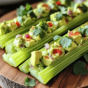 - Celery stalks: Use 6 fresh stalks. They should be crisp and green. Cut them into 4-inch pieces for easy handling. - Creamy avocado filling components: This filling is the star. You need 1 ripe avocado, 1/2 cup Greek yogurt, and 1 tablespoon lemon juice. Add 1/4 cup finely diced red bell pepper and 1/4 cup finely diced red onion for crunch. Don't forget 2 tablespoons of chopped cilantro and 1/4 teaspoon garlic powder for flavor. - Optional toppings and seasonings: You can add salt and pepper to taste. If you like spice, try crushed red pepper flakes to give it a kick. Using fresh ingredients makes the dish stand out. The creamy avocado filling balances the crunchy celery perfectly. For the full recipe, check out the detailed steps in the cooking section. To make stuffed celery, start with fresh ingredients. You need six stalks of celery, an avocado, and Greek yogurt. The creamy filling combines flavors and textures. First, wash and cut the celery into 4-inch pieces. This size is perfect for filling and eating. Next, grab a mixing bowl and add the ripe avocado. Use a fork to mash the avocado. Aim for a smooth mix, but keep some small chunks for texture. Now, add 1/2 cup of creamy Greek yogurt and 1 tablespoon of freshly squeezed lemon juice. Mix these until creamy and well combined. The yogurt adds tang, and the lemon brightens the flavor. Next, fold in 1/4 cup of finely diced red bell pepper and 1/4 cup of finely diced red onion. Add 2 tablespoons of chopped cilantro, 1/4 teaspoon of garlic powder, and salt and pepper to taste. If you like heat, sprinkle in some crushed red pepper flakes. Mix gently to keep the chunks intact. Now, it's time to fill the celery. You can use a spoon or a piping bag for a neat look. Carefully stuff each piece with the creamy avocado mix. Make sure each piece is generously filled. For the final touch, arrange the stuffed celery on a serving platter. You can garnish with extra cilantro leaves or a light dusting of paprika. This adds color and makes the dish look fancy. Serve chilled for a refreshing appetizer that everyone will love! For the full recipe, check the details above. To make your stuffed celery truly shine, focus on enhancing both flavor and texture. Select an avocado that feels slightly soft when you squeeze it gently. A ripe avocado gives a rich, creamy texture. This smoothness pairs perfectly with crunchy celery. If your avocado is too firm, let it ripen on the counter for a couple of days. Seasoning matters! Use a mix of salt, pepper, and garlic powder to elevate the taste. Fresh lemon juice adds brightness and cuts through the creaminess. Add crushed red pepper flakes for some heat if you like spice. Taste as you go, and adjust to your liking. For a fun twist, serve your stuffed celery with a dip on the side. A zesty yogurt dip or a tangy salsa complements the flavors nicely. You could also add a sprinkle of paprika or extra cilantro on top for color and flair. Arrange the celery on a colorful platter for a feast for the eyes. For the complete recipe, check out the [Full Recipe] section of this article. {{image_4}} Stuffed celery can be exciting with many different fillings. You can create unique taste experiences by swapping out the main ingredients. Here are some fun options to try. - Cheese-based fillings: Cream cheese is a classic choice. It adds rich creaminess. Mix it with herbs for more flavor. You can also use goat cheese or feta for a tangy twist. - Nut and seed options: Nuts like walnuts or almonds provide a nice crunch. You can chop them finely and mix them into your filling. Sunflower seeds and pumpkin seeds also work well for a nut-free option. - Vegetarian and vegan adaptations: For a plant-based filling, mash chickpeas with tahini. This gives a creamy texture and adds protein. You can also blend silken tofu with spices for a tasty vegan spread. These variations let you customize stuffed celery for any occasion. Feel free to mix and match ingredients based on what you have at home. Each filling can change the flavor and texture, making the dish fresh and fun each time you serve it. To keep your stuffed celery fresh, start by placing it in an airtight container. This helps lock in moisture and prevents the filling from drying out. If you don’t have a container, you can wrap the celery pieces tightly in plastic wrap. Best practices for refrigeration: - Always refrigerate stuffed celery within two hours of preparation. - Keep it in the coldest part of your fridge. - Store it away from strong-smelling foods to avoid flavor transfer. Reheating methods (if applicable): Stuffed celery is best served cold. If you want to warm it, heat the filling separately and refill the celery. Avoid microwaving the celery directly, as it can become soggy. Shelf life of filled celery: Leftover stuffed celery usually lasts about 2-3 days in the fridge. After that, the texture and taste may decline. Always check for any signs of spoilage before eating. For a full recipe, check out the details provided earlier. Enjoy your cooking! Can I make stuffed celery ahead of time? Yes, you can prepare stuffed celery a few hours before your event. Just keep it in the fridge. This helps the flavors blend. However, I suggest not filling it too far in advance. If you do, the celery might lose its crunch. What else can I stuff in celery? You can get creative! Try cream cheese mixed with herbs. Hummus is another great option. For a protein boost, use tuna salad or chicken salad. You can even stuff celery with peanut butter and raisins for a sweet treat! How do I keep stuffed celery from getting soggy? To avoid soggy celery, store the filling separately. Fill the celery just before serving. You can also use thicker spreads. This helps maintain the celery's crispness. If you want to prep in advance, keep the celery dry and the filling cool. For a delicious and easy recipe, check out the Full Recipe for my creamy avocado stuffed celery delight! Stuffed celery is a fun and easy snack. We covered key ingredients like celery and avocado. Then, we looked at step-by-step instructions for making it. I shared tips to enhance its flavor and texture, along with creative serving ideas. You can also mix it up with different fillings. Lastly, we talked about storing any leftovers safely. Enjoy making stuffed celery your own!