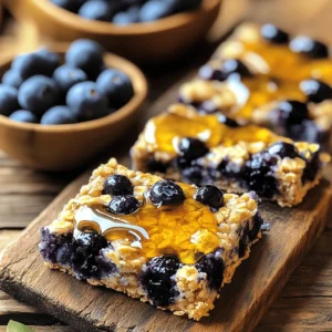 To make these tasty Blueberry Oatmeal Breakfast Bars, you need a few simple items. Here’s your list: - 2 cups rolled oats - 1 cup almond milk (or your preferred milk) - 1 cup fresh or frozen blueberries - 1/4 cup honey or maple syrup - 1/4 cup natural peanut butter (or almond butter) - 1/2 teaspoon vanilla extract - 1 teaspoon baking powder - 1/2 teaspoon ground cinnamon - A pinch of salt - Optional: 1/4 cup chopped nuts or seeds (such as walnuts or chia seeds) These ingredients come together to create a delicious and healthy snack. The oats provide fiber, while blueberries add vitamins and antioxidants. Honey or maple syrup gives it sweetness, and peanut butter adds healthy fats. You can even mix in nuts or seeds for extra crunch. For the full recipe, refer to the earlier section. 1. Preheat your oven to 350°F (175°C). Prepare a 9x9 inch baking dish by lining it with parchment paper. This makes removal easy after baking. 2. In a large mixing bowl, mix the dry ingredients. Combine 2 cups of rolled oats, 1 teaspoon of baking powder, 1/2 teaspoon of ground cinnamon, and a pinch of salt. Stir until even. 3. In a separate bowl, whisk together the wet ingredients. Blend 1 cup of almond milk, 1/4 cup of honey or maple syrup, 1/4 cup of natural peanut butter, and 1/2 teaspoon of vanilla extract. Mix until smooth. 4. Combine the wet and dry ingredients. Pour the wet mix into the dry bowl. Stir until everything is well mixed. Make sure there are no dry spots left. 1. Fold in the blueberries. Add 1 cup of fresh or frozen blueberries. If you like, add 1/4 cup of chopped nuts or seeds. Gently mix to avoid breaking the berries. 2. Transfer to the baking dish. Pour the mixture into your prepared baking dish. Use a spatula to spread it evenly. Press down gently to make it compact. 1. Bake until golden brown. Place the dish in the oven and bake for 25-30 minutes. The edges should turn golden brown, and the center should be set. 2. Cool and slice the bars. After baking, let them cool in the pan for 10 minutes. Use the parchment paper to lift them out. Place the bars on a wire rack to cool completely. Once cool, slice them into bars. Enjoy your Blueberry Oatmeal Breakfast Bars! For the full recipe, check the details above. You can easily switch ingredients to fit your taste. If you want to try different types of milk, go ahead! Almond milk works well, but soy or oat milk are great too. Each milk gives a unique flavor. For sweeteners, honey is a classic choice. It adds a rich taste. Maple syrup is a fun swap for a lighter flavor. Both options are sweet, so use what you like best! Checking for doneness is key. The edges should be golden brown. The center should feel firm to the touch. If it wobbles, give it a few more minutes. Ovens vary, so you may need to adjust baking time. If your oven runs hot, check the bars a bit earlier. If it runs cool, they might need extra time. Always keep an eye on them! When serving, get creative with toppings! A dollop of yogurt adds creaminess. Fresh fruit on top makes it bright and fun. You can also sprinkle some nuts for crunch. Pair these bars with coffee or tea. The warm drink complements the bars well. Enjoy them as a quick breakfast or a snack anytime. They are versatile and delicious! {{image_4}} You can change the flavor of your Blueberry Oatmeal Breakfast Bars easily. Adding spices like nutmeg or ginger can give a warm twist. Just a pinch of these spices can take your bars to the next level. You can also add other fruits. Bananas or apples work great. They add natural sweetness and moisture. If you want to make your bars healthier, consider using less sweetener. You can cut back on honey or maple syrup. This will lower the sugar content without losing flavor. You can also go gluten-free. Simply choose gluten-free oats. They will work just as well in this recipe. To boost protein, try adding protein powder. This simple change makes your bars more filling. You can also include seeds like chia or flaxseed. These seeds add texture and healthy fats. They make your breakfast bars even better for you. For the full recipe, check out the complete guide above. To keep your blueberry oatmeal breakfast bars fresh, store them in airtight containers. This will help prevent moisture and air from making them soggy. You can also refrigerate or freeze them for a longer shelf life. In the fridge, they can last up to a week. If you freeze them, they can stay good for up to three months. At room temperature, these bars last about three days. Always check for signs of spoilage. If you see mold, or if the bars smell off, throw them away. Freshness is key to enjoying these tasty snacks. To enjoy your bars after storage, reheat them in the microwave. Heat for 10 to 15 seconds for a warm treat. You can also pop them in the oven at 350°F for about 5 minutes. This keeps the texture nice and chewy. Enjoy them warm for the best flavor! For the full recipe, click here: [Full Recipe]. Yes, you can use quick oats, but the texture will differ. Quick oats are smaller and cook faster. This will make the bars softer and less chewy. If you want a heartier bite, stick with rolled oats. They hold up better in the baking process. You can try almond butter or sunflower seed butter. Each has a unique taste. Almond butter adds a nutty flavor, while sunflower seed butter is great for nut-free diets. Both work well in the recipe. To make these bars vegan, swap honey for maple syrup. Use almond milk or another plant-based milk instead of dairy milk. This way, you can enjoy the bars without animal products. Yes, you can double the recipe. Just use a larger baking dish, like a 9x13 inch pan. Keep an eye on the cooking time; it may take a few extra minutes to bake through. Yes, they are quite nutritious! They provide fiber from oats and antioxidants from blueberries. Each bar is packed with energy and can help you feel full. You get healthy fats from the nut butter too. You can get creative with toppings! Try adding yogurt, fresh fruit, or a drizzle of honey. You can also sprinkle some chopped nuts for extra crunch. This makes each bar unique and tasty. You now have a tasty recipe for Blueberry Oatmeal Breakfast Bars. We covered the ingredients you need and the steps to make them. I shared tips for swapping ingredients and ways to keep your bars fresh. You can even get creative with flavors and add protein. These bars not only taste great but also offer nutrition. Customize them to fit your needs. Enjoy your homemade bars for breakfast or a snack. Happy baking!