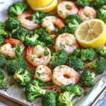 - 1 pound large shrimp, peeled and deveined - 4 cups broccoli florets - 4 tablespoons extra virgin olive oil - 4 cloves garlic, finely minced - 1 lemon, zested and juiced - 1 teaspoon smoked paprika - 1 teaspoon red pepper flakes (optional) - Salt and freshly cracked black pepper - Fresh parsley, finely chopped In this recipe, the main ingredients shine brightly. The shrimp provides a sweet and light base. Broccoli adds a nice crunch and color. The olive oil coats everything in rich flavor. It helps the dish roast well in the oven. For flavor, garlic is a must. It brings a strong, warm taste. The lemon zest and juice add brightness. Smoked paprika gives a hint of smokiness that makes each bite interesting. If you like heat, you can add red pepper flakes. Just a little can make the dish come alive. Seasoning with salt and black pepper is key for balance. Lastly, I love to sprinkle fresh parsley on top. It adds color and a fresh taste. This dish is not just tasty; it's also a feast for the eyes! - Preheat oven to 425°F (220°C). - Combine shrimp and broccoli in a mixing bowl. Start by warming your oven. This heat helps the shrimp and broccoli cook just right. In a big bowl, toss the shrimp with the broccoli florets. Make sure they mix well. This step sets the stage for the tasty flavors to come. - Add olive oil, garlic, lemon zest, lemon juice, smoked paprika. - Season with salt and pepper, and toss thoroughly. Next, pour in the olive oil. Then, add the minced garlic, lemon zest, and lemon juice. Sprinkle in the smoked paprika. Season with salt and freshly cracked black pepper. This mix brings out bold flavors. Use your hands or a spatula to toss everything together. You want each piece to be coated in this zesty mixture. - Prepare sheet pan with parchment paper. - Spread mixture evenly and bake for 10-12 minutes. Now, line a sheet pan with parchment paper. This keeps your food from sticking and makes cleanup easy. Spread the shrimp and broccoli evenly on the pan. This helps them roast nicely. Place the pan in your preheated oven. Bake for about 10-12 minutes. The shrimp will turn pink and opaque, while the broccoli stays crisp. Keep an eye on it; you want them cooked, but not overdone. To cook shrimp perfectly, look for two key signs. First, it should turn a lovely pink color. Second, it should be opaque. When you see these signs, your shrimp is done! For the broccoli, keep it crisp by not overcooking. Bake it for about 10-12 minutes. This way, it stays bright green and crunchy. If you feel unsure, check it a minute early. You want it tender but not mushy. When it comes to serving, presentation matters. Serve the shrimp and broccoli over a fluffy bed of rice or quinoa. A lemon wedge on the side adds a nice touch. It gives a fresh look and a burst of flavor. You can also use a large, flat plate to show off the colors. You can make this dish even more exciting! Add a pinch of cayenne for spice. Fresh herbs like basil or cilantro can also boost the flavor. To balance the taste, consider a drizzle of honey or a splash of soy sauce. These additions can create a new twist on this classic dish. Experiment and enjoy! {{image_4}} You can swap shrimp for other proteins. Chicken works great and adds a hearty bite. Use boneless chicken breast, cut into bite-sized pieces. For a vegetarian option, try tofu. Firm tofu holds up well when roasted. Cooking times vary: - Chicken takes about 15-20 minutes to cook through. - Tofu needs about 12-15 minutes to get golden and crisp. Mix it up with different vegetables! Bell peppers add sweetness, while asparagus gives a nice crunch. Zucchini is another great choice; it cooks quickly and adds moisture. Adjust cooking times: - Bell peppers and zucchini can roast in about 10-12 minutes. - Asparagus may need a little more time, around 12-15 minutes. Get creative with your seasonings! Try adding cumin or curry powder for a unique twist. Fresh herbs like thyme or rosemary can also brighten the dish. Citrus variations: - Lime adds a tangy kick if you want a twist. - Orange zest can bring a sweet note to balance flavors. Feel free to explore these variations to find your favorite version of this dish! To keep your shrimp and broccoli fresh, cool the dish quickly. Place leftovers in a shallow container. This helps them cool faster. Use an airtight container to prevent odors. Store in the fridge for up to three days. If you want to keep it longer, freeze it. Transfer leftovers to a freezer-safe bag. Remove as much air as possible. This will prevent freezer burn. When reheating, use the oven for the best texture. Preheat your oven to 350°F (175°C). Place the shrimp and broccoli on a baking sheet. Heat for about 10 minutes, or until warm. If you're in a hurry, you can use the microwave. Heat in 30-second intervals on medium power. Check often to avoid overcooking. The shrimp should remain tender, and the broccoli should stay crisp. Your shrimp and broccoli should stay fresh for three days in the fridge. After that, check for any changes. Signs of spoilage include a sour smell or slimy texture. If you see any signs, it’s best to toss it out. If frozen, it can last for up to three months. However, for the best taste, eat it within one month. Always trust your senses. If it looks or smells off, don’t eat it. Yes, you can prepare this dish ahead of time. - To save time, chop the broccoli and mince the garlic a day before. - Store the shrimp in the fridge, covered, until you are ready to cook. - Combine the shrimp with the broccoli and seasoning just before baking. This way, you keep the shrimp fresh and flavorful. Absolutely, you can spice it up! - Add more red pepper flakes for extra heat. - Try a dash of hot sauce or a pinch of cayenne pepper. - For a kick, use chili garlic sauce in place of garlic. Adjust the spice to fit your taste. You have many options for shrimp substitutes. - Chicken breast works well; cut it into small pieces. - Firm tofu gives a nice texture; press it first to remove water. - Use scallops or fish like salmon for a different flavor. Adjust cooking time as needed, since proteins cook differently. This dish is easy and rewarding. You learned about key ingredients like shrimp and broccoli, and how to mix and bake them perfectly. Remember the tips for cooking times and texture. You can even switch proteins or veggies for variety. Store leftovers right to enjoy later. Testing flavors can lead to new favorites. Try these ideas, and you’ll impress anyone at the table. Cooking simple meals like this can be fun and fulfilling. Enjoy your cooking journey!