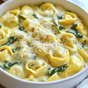 - 12 oz cheese tortellini (fresh or frozen) - 1 can (14 oz) artichoke hearts, drained and roughly chopped - 3 cups fresh spinach, roughly chopped In this dish, cheese tortellini serves as the base. You can use fresh or frozen tortellini. The artichoke hearts add a unique flavor. They bring a nice, tangy taste to the meal. Fresh spinach adds color and nutrition. It wilts down nicely in the creamy sauce. - 1 cup heavy cream - 1 cup vegetable broth - 1 cup freshly grated Parmesan cheese Heavy cream creates a rich sauce. It makes the dish feel indulgent. Vegetable broth adds depth to the flavor. It combines well with the cream. Parmesan cheese enhances the dish's taste. It melts wonderfully and gives a cheesy finish. - 2 tablespoons olive oil - 2 cloves garlic, minced - 1 teaspoon dried Italian herbs (a mix of oregano, basil, and thyme) - Salt and pepper to taste - 1/4 teaspoon red pepper flakes (optional, for a kick) Olive oil is great for saut&eacute;ing garlic. It brings out the garlic's flavor. Dried Italian herbs add a nice aroma. Salt and pepper are essential for seasoning. If you like a bit of heat, add red pepper flakes. They give a nice kick to the dish. {{ingredient_image_2}} 1. First, warm the olive oil in a large pot over medium heat. 2. Next, add the minced garlic and saut&eacute; it for 1-2 minutes. Watch closely to avoid browning. 3. Now, add the chopped artichoke hearts. Cook for another 2-3 minutes. Stir occasionally to blend the flavors. 1. Carefully pour in the vegetable broth and heavy cream. 2. Stir until everything is combined. 3. Increase the heat slightly and bring the mixture to a gentle simmer. 1. Add the cheese tortellini to the pot. Cook according to the package instructions, about 3-5 minutes. 2. Stir occasionally until the tortellini are tender and heated through. 1. Once the tortellini are cooked, stir in the chopped spinach. 2. Add the grated Parmesan cheese next. 3. Mix gently until the spinach wilts and the cheese melts. 4. Season the dish with dried Italian herbs, salt, pepper, and red pepper flakes if you like. 5. Stir once more to blend all flavors together. To keep your tortellini from getting mushy, follow these steps: - Cook the tortellini according to the package instructions. - Stir them gently while cooking. This helps them cook evenly. Stirring often is key. It prevents sticking and burning. When you add the tortellini to the pot, make sure to stir well. This helps them absorb the flavors of the sauce. You can easily boost the flavor of your dish. Here are some ideas: - Add fresh herbs like basil or parsley. They brighten the taste. - For a stronger kick, sprinkle in more red pepper flakes. - Consider mixing in fresh garlic or shallots for depth. If you love cheese, try adding more Parmesan or a sprinkle of mozzarella. It melts beautifully and adds richness. Presentation makes a huge difference. Serve your tortellini in deep bowls. This allows for a nice, creamy coating. - Top with extra grated Parmesan. It looks great and tastes even better. - A sprinkle of black pepper adds a nice touch. - Fresh herbs like basil or parsley make your dish pop. Pair this dish with a simple green salad or garlic bread. They complement the creamy tortellini well. Enjoy your meal! Pro Tips Use Fresh Ingredients: Whenever possible, opt for fresh spinach and high-quality cheese tortellini to enhance the flavor and texture of the dish. Customize the Heat: Adjust the amount of red pepper flakes based on your spice preference; you can also substitute with a pinch of cayenne for a different kick. Make it Vegan: Substitute the heavy cream with coconut cream or a plant-based cream alternative and use nutritional yeast instead of Parmesan for a vegan version. Garnish for Presentation: Elevate the dish by garnishing with fresh herbs like basil or parsley and an extra sprinkle of Parmesan cheese before serving. {{image_4}} You can easily swap some ingredients in this dish. For a gluten-free option, choose gluten-free tortellini. Many stores offer this choice. You can also use zucchini or bell peppers instead of artichokes. These veggies add great taste and color. If you want a vegan dish, use plant-based cheese and cream. Many brands now offer great alternatives. For broth, choose a vegetable or mushroom base. These options keep the flavor rich and creamy without dairy. You can add proteins to make it heartier. Chicken or shrimp works well with this dish. Just cook them with the garlic first. You can also try different herbs for extra flavor. Fresh basil or parsley adds a nice touch. Experiment with these ideas for a dish that fits your taste. To keep your One-Pot Spinach Artichoke Tortellini fresh, follow these tips: - Allow the dish to cool to room temperature. - Transfer it to an airtight container. - Store it in the fridge for up to 3 days. Using glass or BPA-free plastic containers works best. They keep the flavors locked in and are easy to clean. You can reheat your tortellini in two ways: microwave or stove. - Microwave: Place a portion in a bowl. Heat for 1-2 minutes, stirring halfway. - Stove: Warm a pan on medium heat. Add a splash of broth or cream to keep it creamy. Stir until heated through. Adding liquid prevents the dish from drying out and keeps it delicious. Yes, you can freeze One-Pot Spinach Artichoke Tortellini! Here&rsquo;s how: - Cool the dish completely. - Use a freezer-safe container or heavy-duty freezer bags. - Remove as much air as possible to avoid freezer burn. To reheat from frozen, thaw it overnight in the fridge. Then, follow the reheating tips for best results. Enjoy your tasty leftovers later! Yes, you can use frozen spinach. However, it may change the texture. Frozen spinach holds more water, which can make the dish a bit soupy. If you do use frozen spinach, make sure to thaw and drain it well before adding it to the pot. This helps keep your dish creamy and flavorful. This dish keeps well for about 3 to 4 days in the fridge. Store it in an airtight container. Make sure it cools completely before sealing it. This will help maintain its taste and texture. If your sauce is too thick, you can easily fix it. Just add a little more vegetable broth or heavy cream. Stir it in slowly until you reach your desired consistency. You can also add a splash of water if needed. This keeps the sauce creamy without losing flavor. This dish uses cheese tortellini, artichoke hearts, and spinach for great flavor. Add heavy cream, vegetable broth, and seasonings to create a rich sauce. You learned tips on cooking and flavor enhancements to make it your own. Don&rsquo;t forget serving ideas and how to store leftovers. With simple steps and easy ingredients, you can enjoy this dish any night. Whether you stick to the recipe or switch things up, cooking can be fun and satisfying. Try making it today!